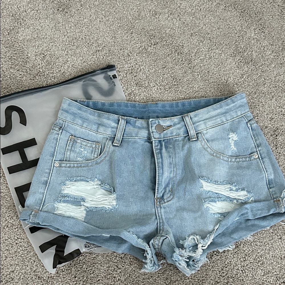 SHEIN Light Blue Ripped Jean Shorts